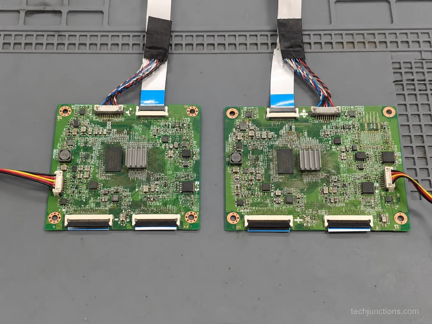 TCL and Insignia Roku TV boards side by side showing shared parts