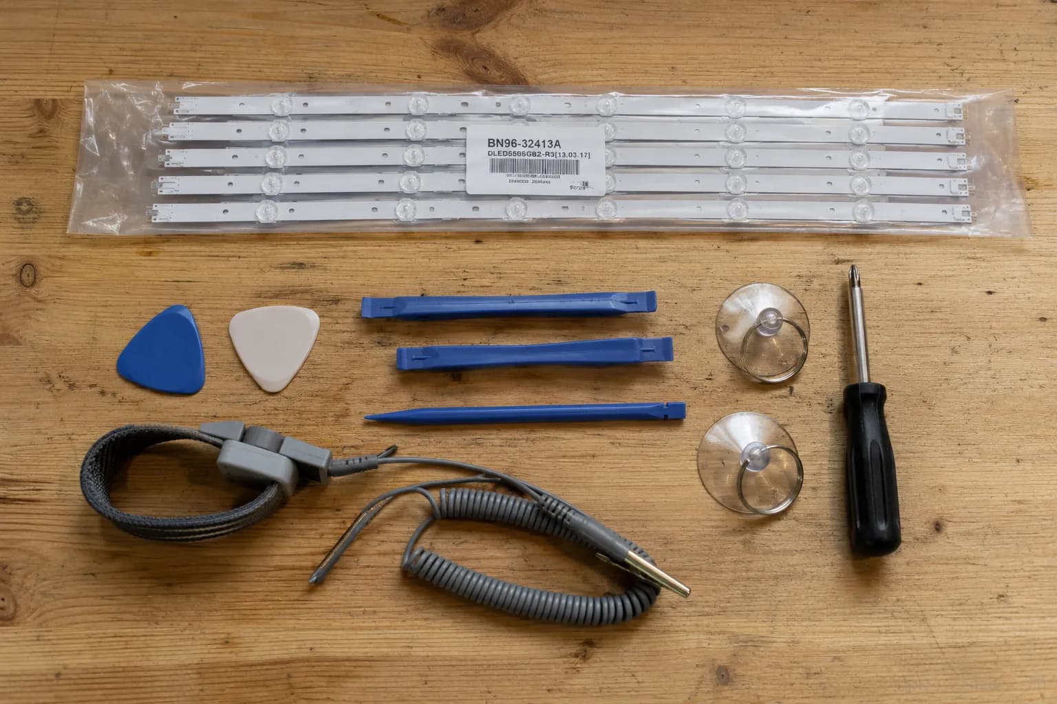 Samsung TV backlight replacement kit with LED strips, spudgers, suction cups and anti-static strap