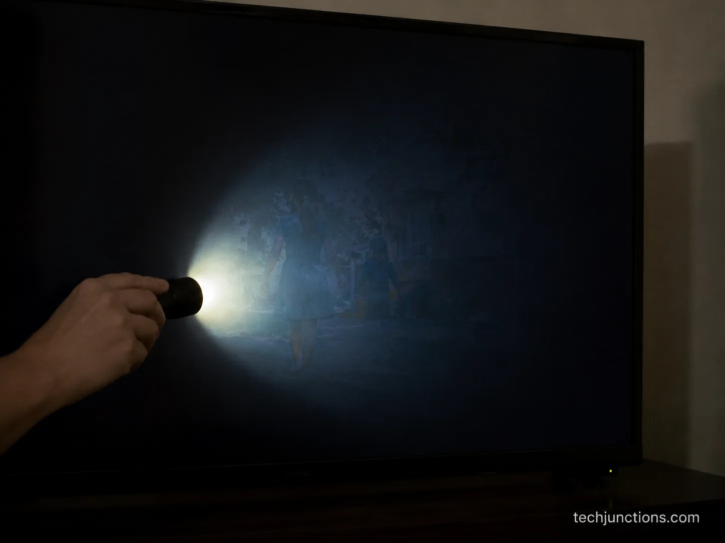 flashlight test showing faint image on a TV with backlight failure