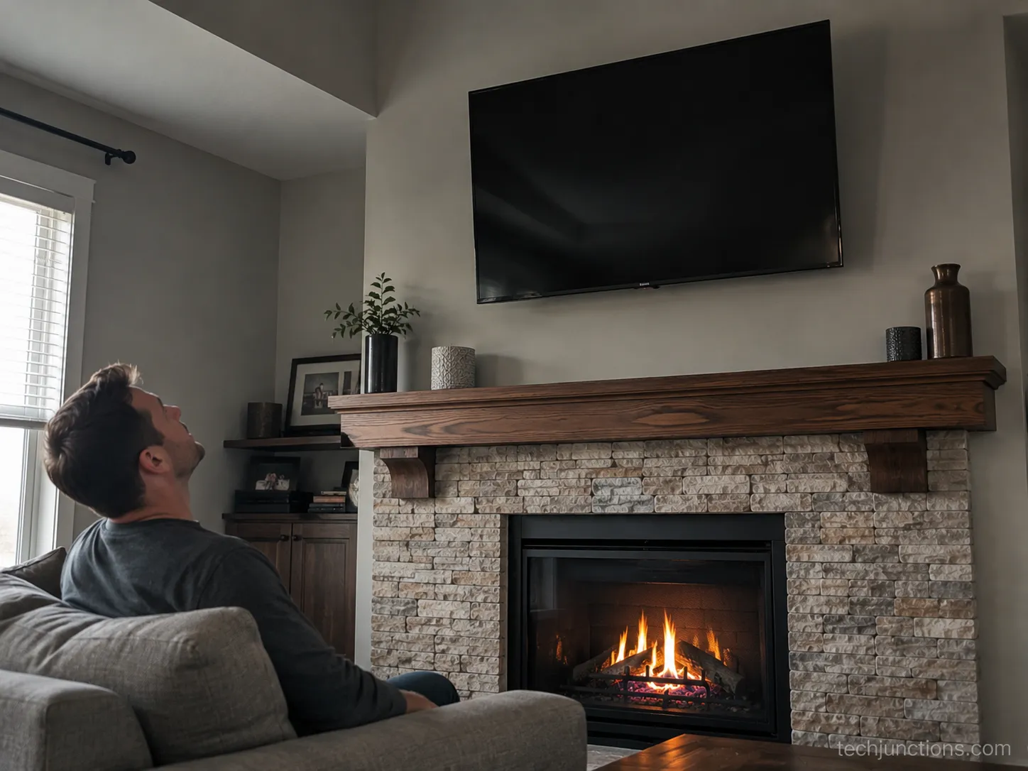 common mistake of a TV mounted too high above a fireplace