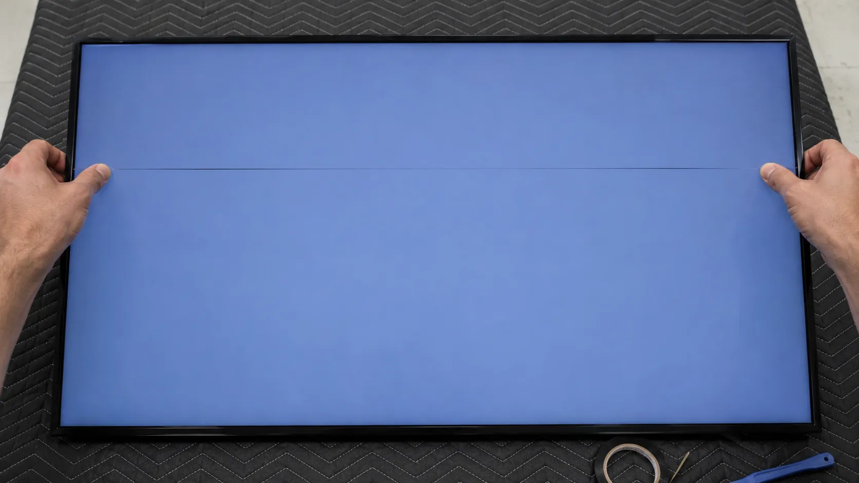 Bezel squeeze test clearing a horizontal line on a Samsung TV
