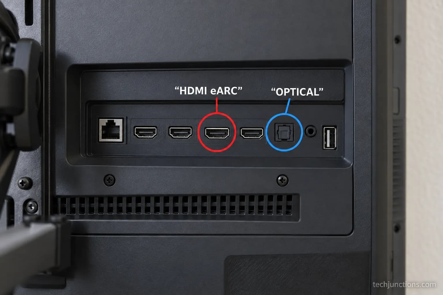 LG TV rear panel with the HDMI eARC port and optical audio out port circled and labeled.